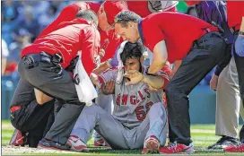  ?? OTTO GREULE JR. / GETTY IMAGES ?? Angels pitcher Matt Shoemaker needed emergency surgery after a Sept. 4 line drive fractured his skull. He also had bleeding in his brain.