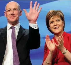  ??  ?? Hands on: John Swinney and Nicola Sturgeon yesterday