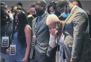  ?? JASON ARMOND LOS ANGELES TIMES/TRIBUNE NEWS SERVICE ?? Sahreeduh Tate, a cousin of George Floyd, cries during the eight-minute, 46-second moment of silence during Floyd's memorial service at North Central University in Minneapoli­s on Thursday.