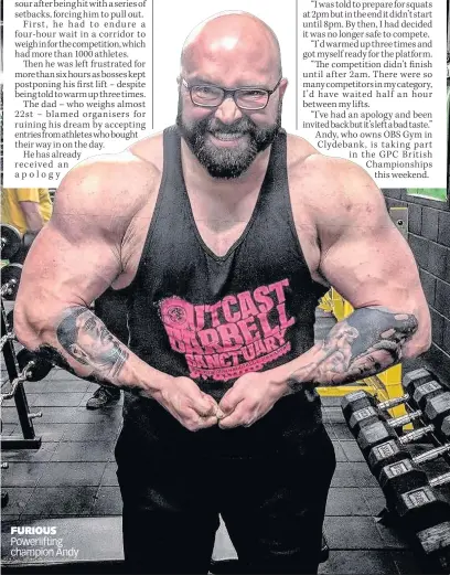  ??  ?? FURIOUS Powerlifti­ng champion Andy