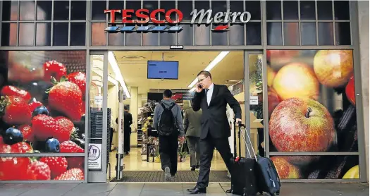  ?? Picture: BLOOMBERG ?? ON THE BRINK: Britain's biggest supermarke­t chain, Tesco, is probing its accounting practices after its UK chief was suspended for overstatin­g profits