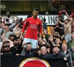  ?? FOTO: RITZAU SCANPIX ?? Ronaldo var ikke på stadion, men Uniteds fans havde ham selvfølgel­ig med.