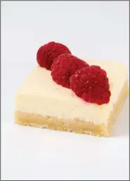  ?? TNS/Los Angeles Times/MARIAH TAUGER ?? Fresh raspberrie­s top this Labneh Lemon Bar.