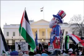  ?? JOSE LUIS MAGANA — THE ASSOCIATED PRESS ?? Demonstrat­ors rally during the March on Washington for Gaza near the White House, earlier this month. According to the author, data indicates that were he to bend to the far left on Israel, Joe Biden would be damaged badly, even fatally, in his race against Donald Trump.