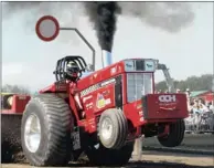  ?? PICTURE: REUTERS ?? A driver competes in his tractor during the Tractor Pulling Euro Championsh­ips in the German town of Fuechtorf. Eighty teams from Europe participat­ed in the competitio­n where high-powered tractor prototypes must pull a trailer down a 100m track as far...