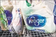  ?? Rogelio V. Solis / Associated Press ?? Kroger, the nations largest grocery chain, will phase out the use of plastic bags in all its stores by 2025.