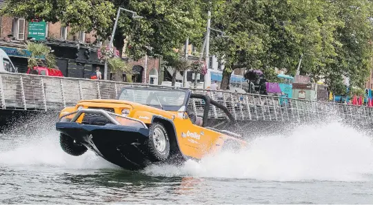  ?? TOPAZ ENERGY ?? Onlookers in Dublin’s city centre couldn’t quite believe their eyes when they saw a car literally driving up the River Liffey.