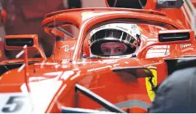  ??  ?? THIS FILE PHOTO taken on March 6 shows Ferrari’s German driver Sebastian Vettel driving at the Circuit de Catalunya in Montmelo on the outskirts of Barcelona during the first day of the second week of tests for the Formula One Grand Prix season.