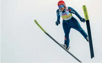  ?? Foto: Ralf Lienert ?? Doppel-Weltmeiste­rin Katharina Althaus und die Frauen würden gerne im Programm der Vierschanz­entournee der Männer springen.