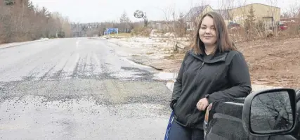  ?? LYNN CURWIN/TRURO NEWS ?? Megan White drove across this section of William Barnhill Drive Monday morning, when there was no gravel in the hole in the road. She believes that, although gravel has now been placed in the hole, warning signs should be erected.