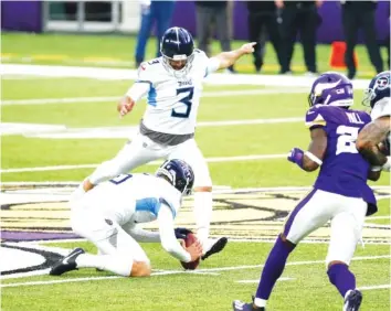  ?? AP PHOTOS/BRUCE KLUCKHOHN ?? Tennessee Titans kicker Stephen Gostkowski (3) kicks a 55-yard field goal against the Minnesota Vikings on Sunday. The kick provided the winning points in a 31-30 Titans victory.