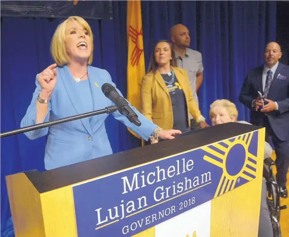  ?? GREG SORBER/JOURNAL ?? Michelle Lujan Grisham addresses her supporters after winning the Democratic primary for governor. She describes herself as “socially liberal. I believe in total equality. And I’m a fiscal conservati­ve.”