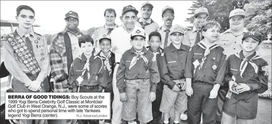  ?? N.J. Advance/Landov ?? BERRA OF GOOD TIDINGS: Boy Scouts at the 1999 Yogi Berra Celebrity Golf Classic at Montclair Golf Club in West Orange, N.J., were some of scores who got to spend personal time with late Yankees legend Yogi Berra (center).