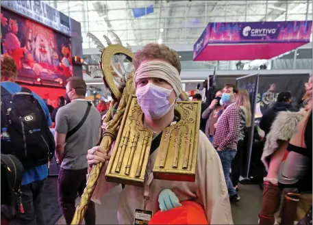  ?? STU CAHILL — BOSTON HERALD ?? Brace for lots of wild outfits, like this one, as PAX East hits the Seaport.