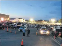  ?? TELEGRAM FILE PHOTO ?? Crowds gather outside St. Kevin’s Parish Hall in the Goulds in August for the final draw of the hugely popular Chase the Ace fundraiser.