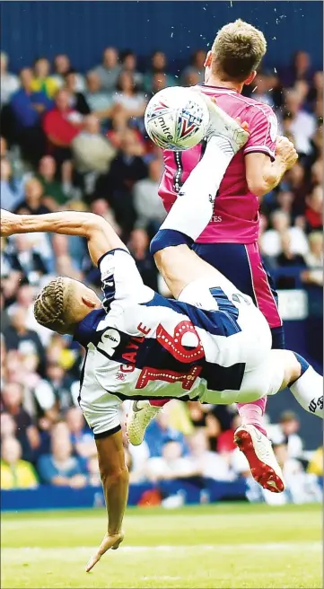  ??  ?? ACROBATIC: ACROBATIC: Dwight Dwight Gayle Gayle tries tries an an overhead overhead kick kick