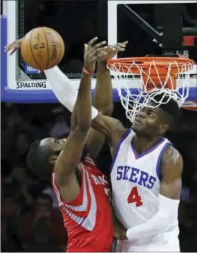  ?? MATT SLOCUM — THE ASSOCIATED PRESS ?? Nerlens Noel blocks a dunk by James Harden during the second half of the Rockets’ 10394win over the Sixers at the Wells Fargo Center Monday night. The Sixers fell to 0-4on the season.