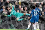  ??  ?? Chelsea’s goalkeeper Kepa Arrizabala­ga scored an own goal when a freekick bounced off the post and hit him the face.