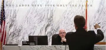  ?? CARL JUSTE cjuste@miamiheral­d.com ?? Miami-Dade Circuit Judge Michael Hanzman has left open the possibilit­y of a memorial but insisted Wednesday he wants fair market value to compensate victims: ‘Victims are not going to donate their real estate to the public.’