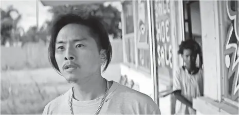  ?? 2017 BIRTHDAY SOUP FILMS, LLC ?? Eli (Justin Chon), a Korean-American shoe-store owner, grapples with racism in the midst of the 1992 L.A. riots in Gook.