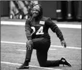  ?? Associated Press ?? HE’S BACK Seattle Seahawks running back Marshawn Lynch stretches during warmups at the NFL football team’s practice facility on Tuesday in Renton, Wash.