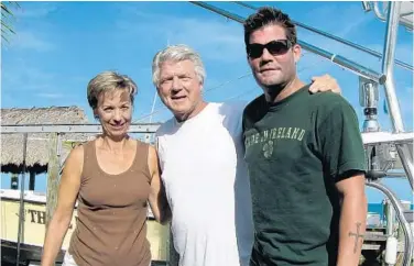  ?? PHOTO COURTESY OF JOHNSON FAMILY ?? Chad Johnson battled alcololism for years, and it nearly ruined his life. But Chad, pictured with father Jimmy Johnson and his wife Rhonda, turned his life around, starting a treatment center that has helped hundreds over the past six years.