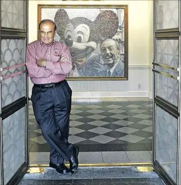  ?? Jae C. Hong Associated Press ?? MARTY SKLAR pauses before an image of Mickey Mouse and Walt Disney at Disneyland in Anaheim.