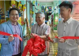  ??  ?? USTMuseum director Fr. Isidro Abaño, OP; UST archivist Regalado Trota José, Bro. Bryan Reyes