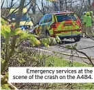  ?? ?? Emergency services at the scene of the crash on the A484.