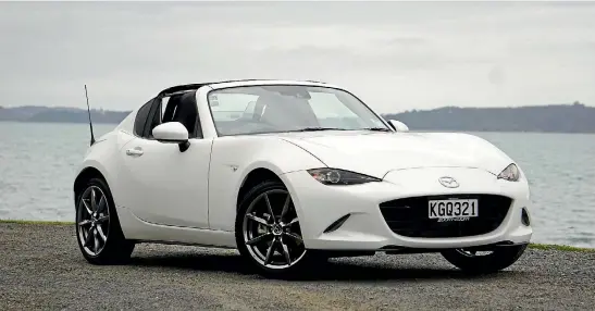  ??  ?? You can now have your MX-5 with a hard-top. Sorry, Retractabl­e Fastback (RF).