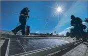  ?? Irfan Khan Los Angeles Times ?? PACE LOANS help homeowners fund energyeffi­cient home improvemen­ts such as solar panels.