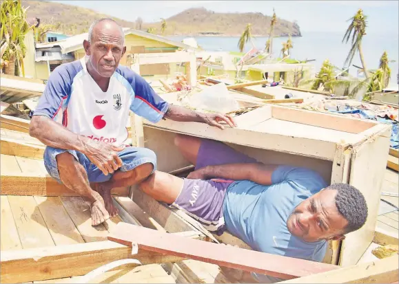  ?? Picture: JOVESA NAISUA ?? Josefa Rokogata, 36, shows the cabinet he and his uncle Sunia Qera, 61, sought refuge in at the height of STC Yasa.