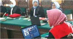  ?? DIMAS MAULANA/JAWA POS ?? TERDAKWA DI LAPAS: PN Sidoarjo melakukan persidanga­n dengan menggunaka­n video conference kemarin.