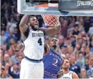  ?? BOB DONNAN/USA TODAY SPORTS ?? Villanova forward Eric Paschall, dunking against Kansas’ Lagerald Vick, will be a force on offense and defense.