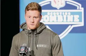  ?? Michael Hickey/Getty Images ?? Kentucky quarterbac­k Will Levis speaks to the media during the NFL Combine at Lucas Oil Stadium on Friday in Indianapol­is.