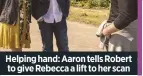  ??  ?? Helping hand: Aaron tells Robert to give Rebecca a lift to her scan
