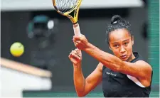  ?? ANNE-CHRISTINE POUJOULAT AFP VIA GETTY IMAGES ?? Canadian Leylah Fernandez required treatment of a foot injury in the first set.