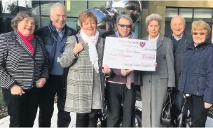  ??  ?? (From left) Sue Winder, Dave Hollin, Liz Mcmillan, Vicky Bissett, Anne Bruce, Frank Winder and Ruth Thomason of the Christie Appeal Macclesfie­ld