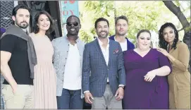  ??  ?? Cast members from “This Is Us,” from left, Milo Ventimigli­a, Mandy Moore, Sterling K. Brown, Jon Huertas, Justin Hartley, Chrissy Metz and Susan Kelechi Watson.