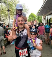  ??  ?? Reader Gareth Edmondson, with Gwion and Nia, after completing his, and their, first triathlon in Swansea