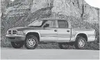  ?? DODGE ?? The 2001 Dodge Dakota 4x4 Quad Cab SLT.