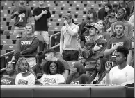  ?? AFP ?? Temple Owls fans sit during the national anthem prior to the game against the Charlotte 49ers at Lincoln Financial Field on Saturday in Philadelph­ia, Pennsylvan­ia.