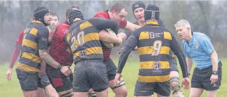  ?? Ian Moss ?? Widnes’s late try hero Sam Bryan is surrounded by Leigh defenders.