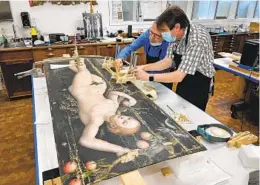  ?? ?? After cleaning Cranach’s “Eve,” conservato­rs George Bisacca and José de la Fuente began stabilizin­g the thin wood panel.