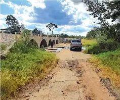  ?? ?? Ngwazani River bridge has been rebuilt and the community’s trauma has slowly turned to joy.