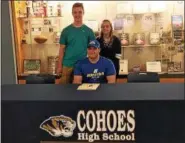  ?? MIKE GWIZDALA - MGWIZDALA@DIGITALFIR­STMEDIA.COM ?? Cohoes senior wrestler and NYSPHSAA runner-up Reggie Poulin is all smiles after signing his National Letter of Intent to compete at Hofstra next year.