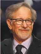  ?? Daniel Leal-Olivas / AFP / Getty Images ?? Steven Spielberg mysterious­ly takes control of your emotions. Do not try to fight.