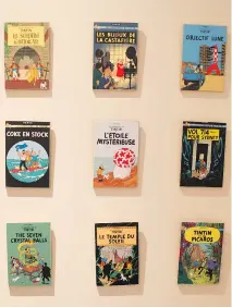  ??  ?? Perera has a collection of Tin Tin covers in the bathroom of his apartment.