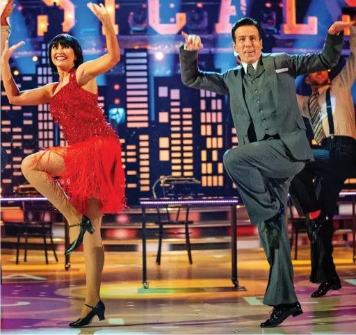  ??  ?? Shake a leg: Anton du Beke and Emma Barton got their best score of the series for doing the Charleston on Saturday
