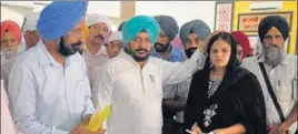  ?? HT PHOTO ?? Punjab forest minister Sadhu Singh Dharamsot with Wing Commander Mandeep Singh Dhillon’s widow Prabhpreet Kaur at the ‘bhog’ ceremony in Patiala on Sunday.